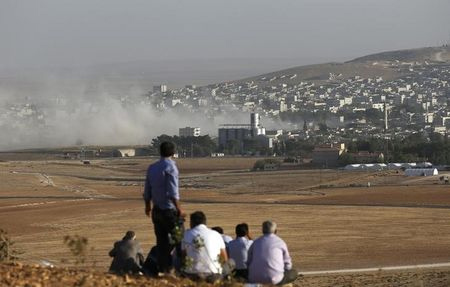 observan las batallas en kobani