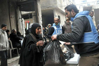 reparto de alimentos en homs