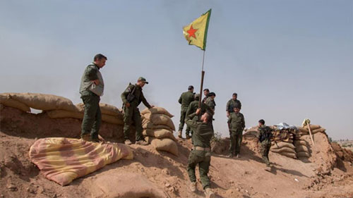 miembros de las Unidades de Protección Popular (YPG)