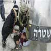 Polic&#237a israel&#237 ataca los palestinos en Cisjordania