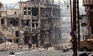 El pacto que permite a los rebeldes salir de Homs