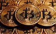 El bitcoin cae por debajo de los 6.000 dólares 